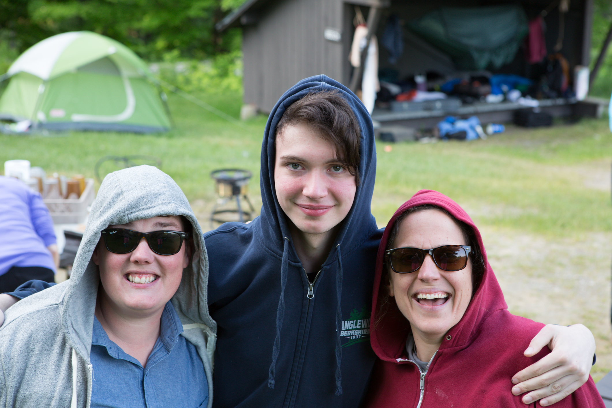 three people camping