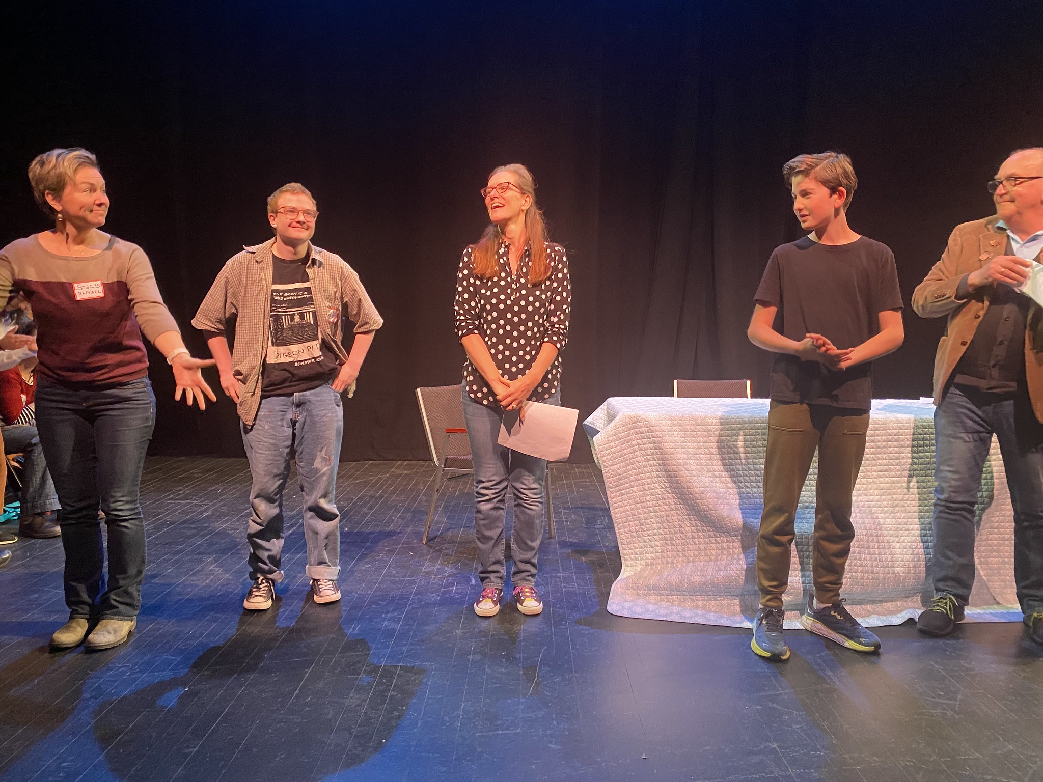 RPS Student on stage with the actors who performed his play