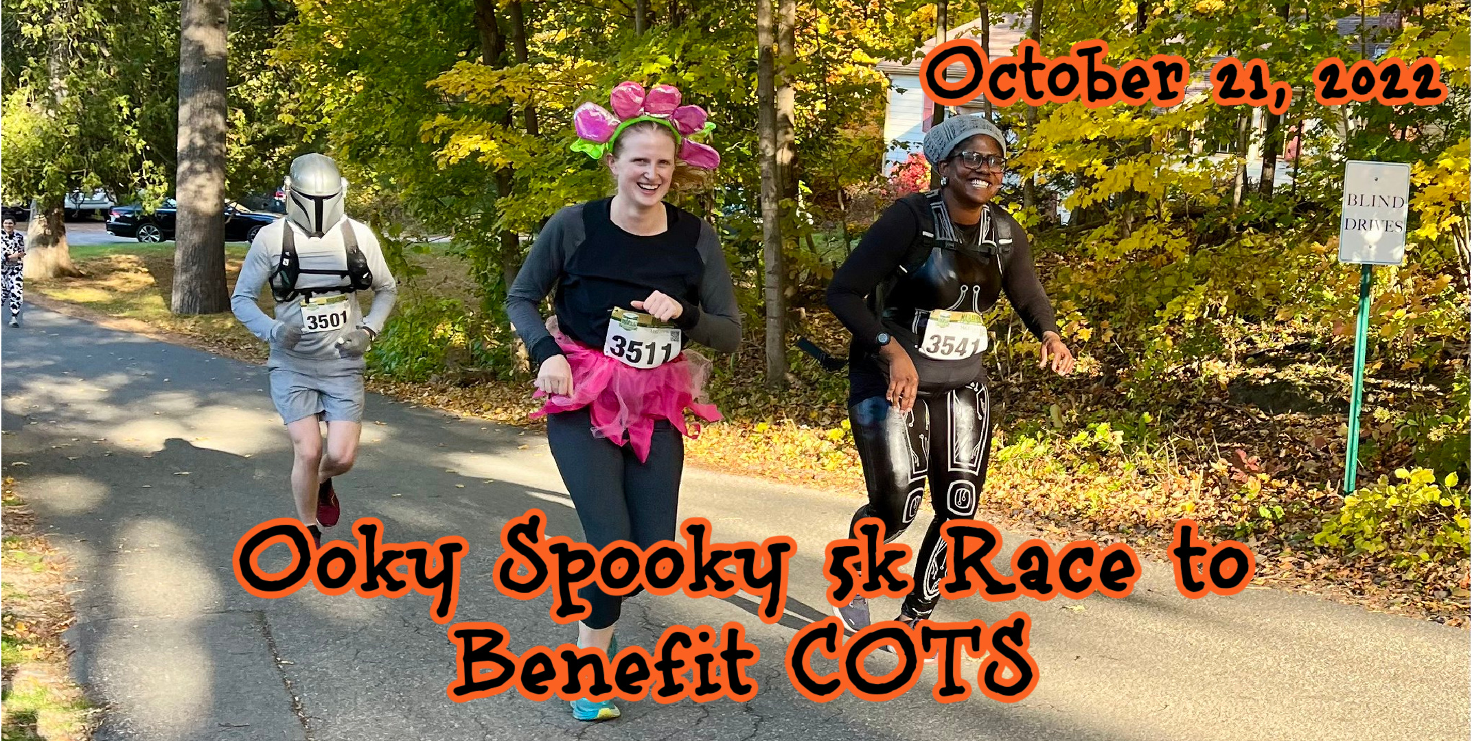 A Mandalorian, a flower, and a skeleton run in the 2022 Ooky Spooky 5K