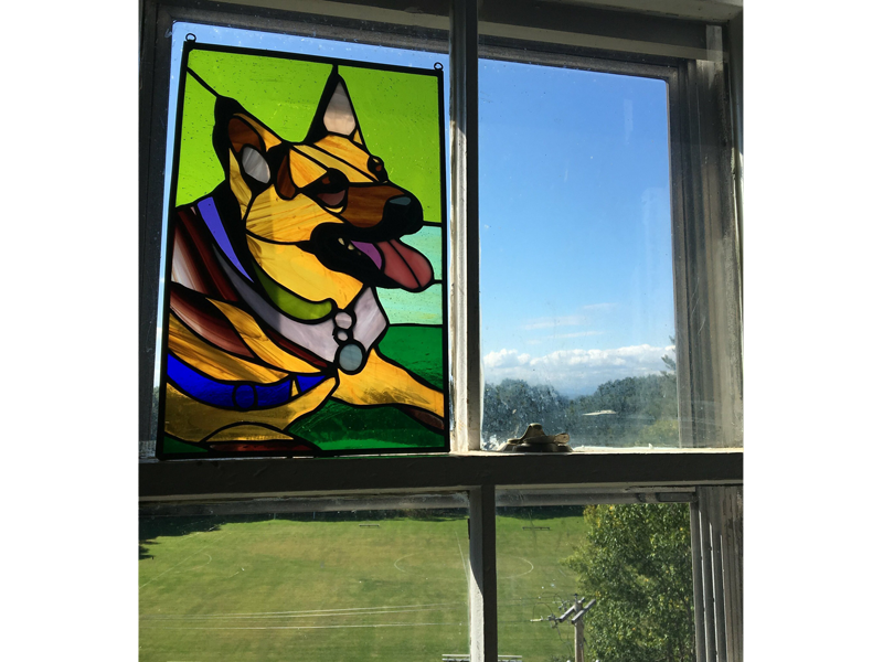 Stained-glass dog in the window